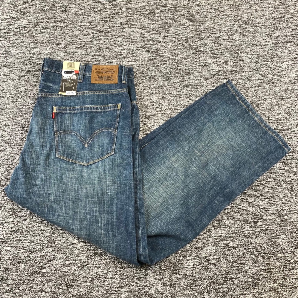 NWT Levis 557 Jeans Mens 44x32 Relaxed Bootcut Blue Denim 100 Percent Cotton